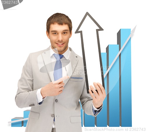 Image of businessman with arrow and 3d chart