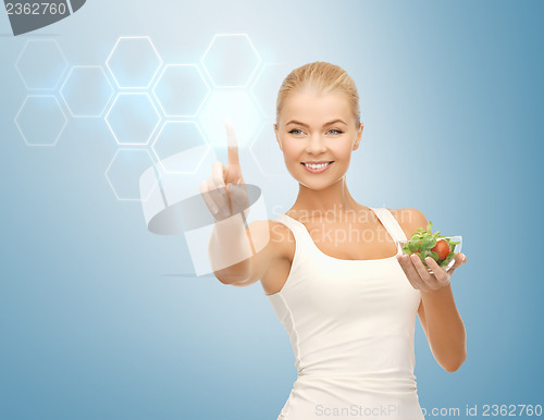 Image of woman with salad and virtual screen