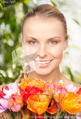 Image of lovely woman with red flowers