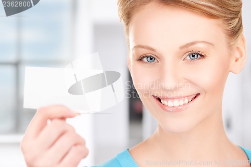 Image of happy woman with business card