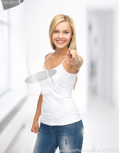 Image of woman in blank white t-shirt pointing at you