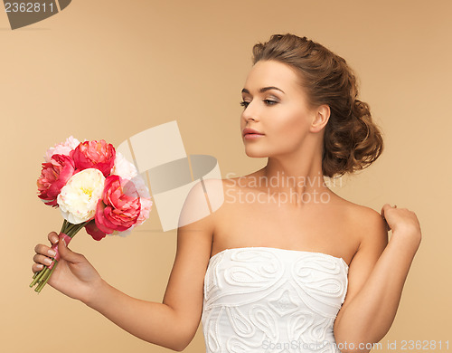 Image of woman with bouquet of flowers