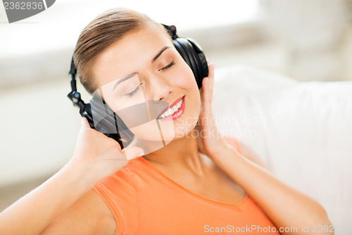 Image of woman with headphones