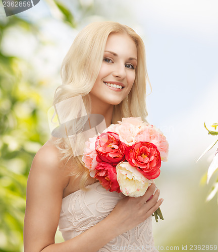 Image of woman with bouquet of flowers