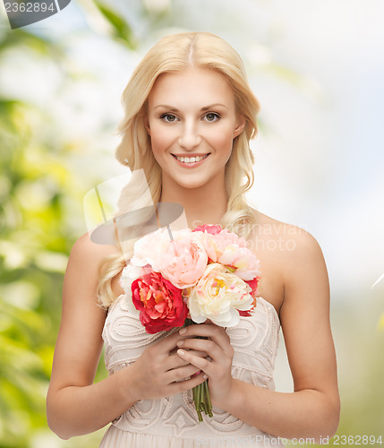 Image of woman with bouquet of flowers