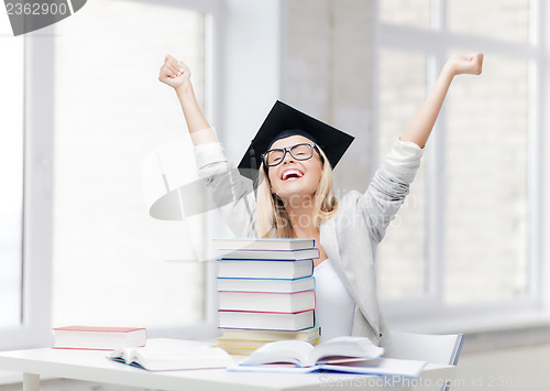 Image of happy student in graduation cap