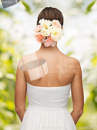 Image of woman with flowers in her head