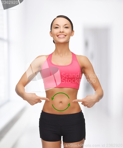 Image of woman with arrows on her stomach