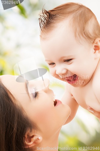 Image of happy mother with adorable baby