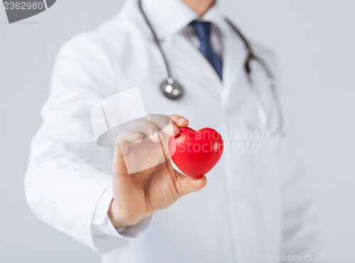 Image of man hands with heart