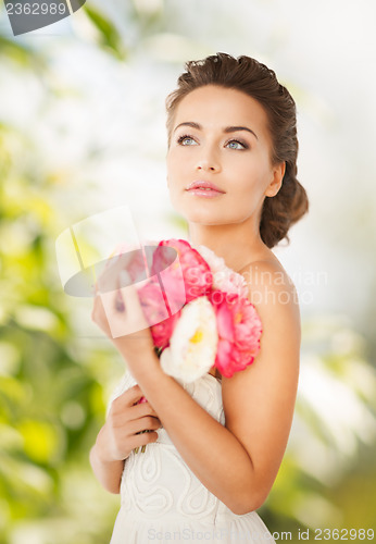 Image of woman with bouquet of flowers