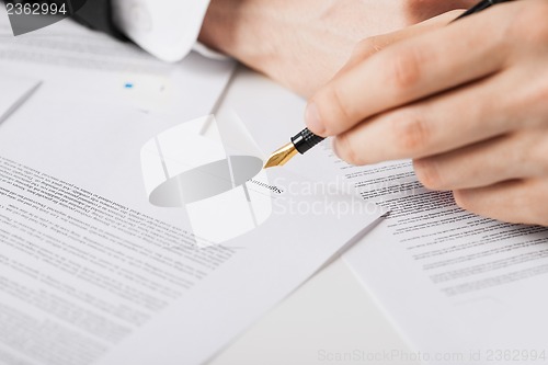 Image of man with contract