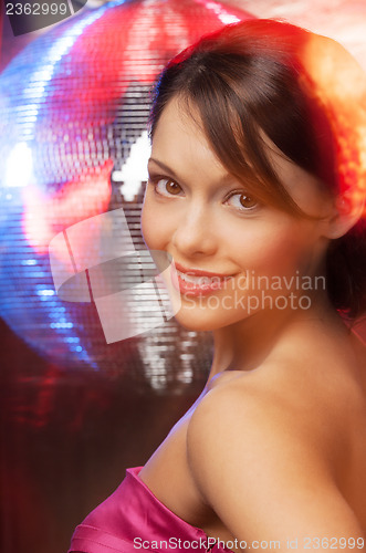 Image of woman with disco ball