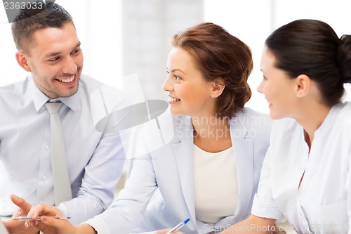 Image of business team having discussion in office