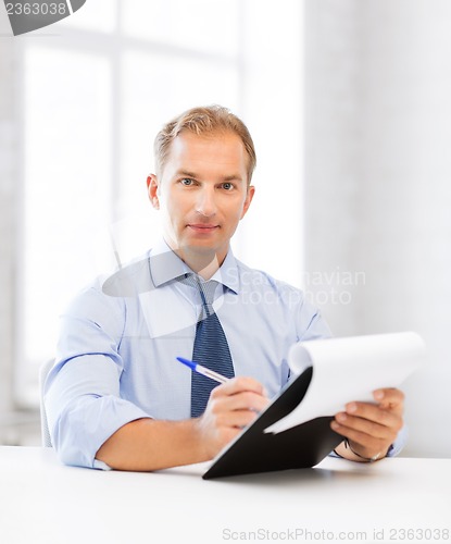 Image of businessman taking employment inteview