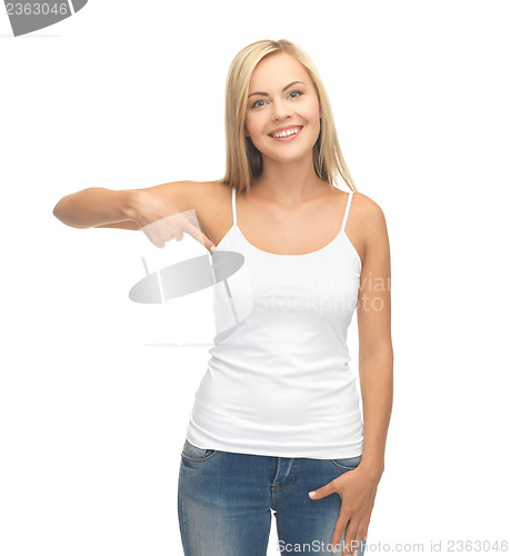Image of woman in blank white t-shirt pointing at herself