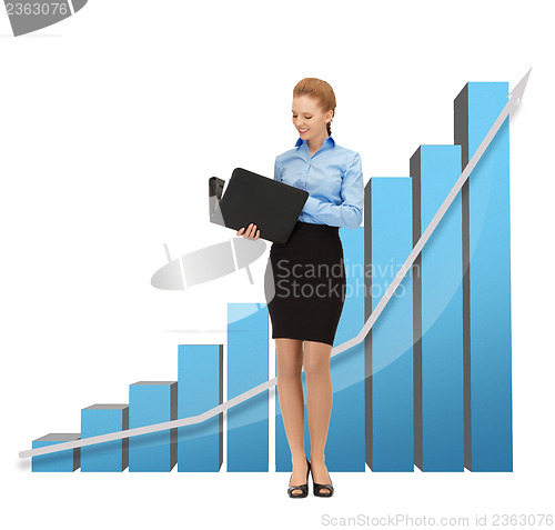 Image of businesswoman with big 3d chart and folder