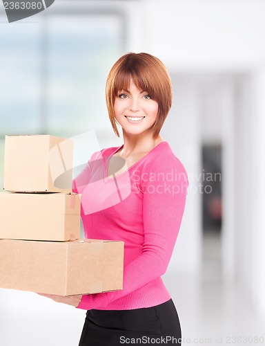 Image of businesswoman with parcels