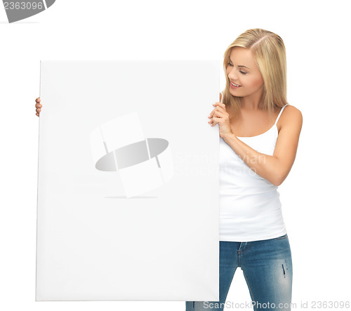 Image of woman with white blank board