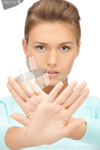 Image of woman making stop gesture