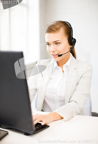 Image of friendly female helpline operator