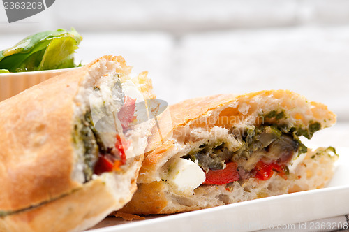 Image of ciabatta panini sandwichwith vegetable and feta