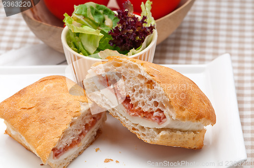 Image of ciabatta panini sandwich with parma ham and tomato