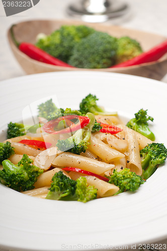 Image of Italian penne pasta with broccoli and chili pepper