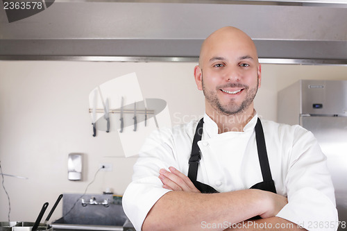 Image of Portrait of a professional chef smiling