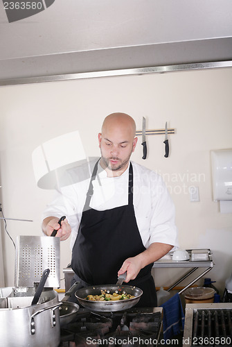 Image of chef working and cooking 