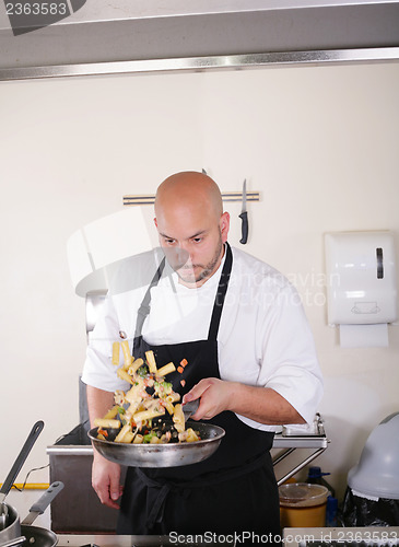 Image of chef prepare tasty food in kitchen 