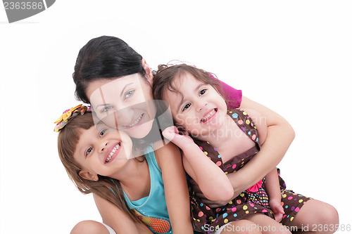 Image of Happy mother and two daughters. Isolated on white background