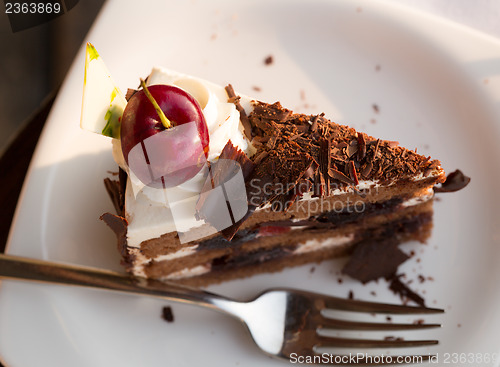 Image of chocolate cake with cherries