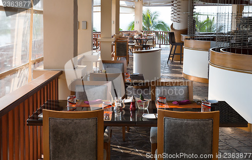 Image of Table and chairs in empty cafe