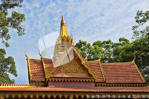 Image of Oriental temple decorated with a golden roof