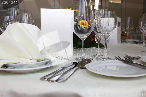 Image of Luxury place setting with a menu card