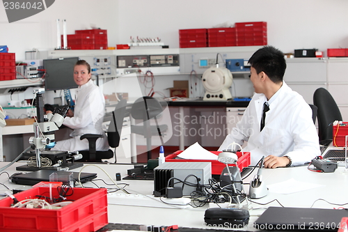 Image of Technicians working in a modern laboratory