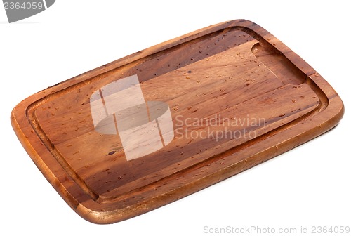 Image of Wooden kitchen board with water drops