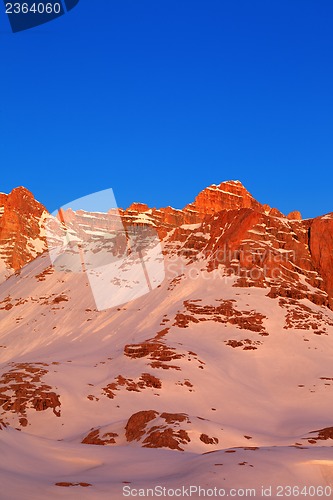 Image of Sunrise in snow mountains