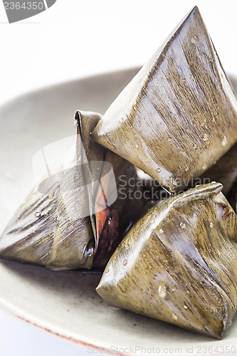 Image of Close up stuffed dough pyramid dessert