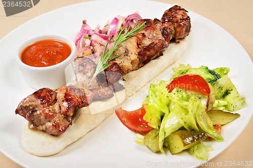 Image of Kebab on a pita