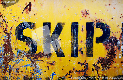 Image of Rusty yellow skip