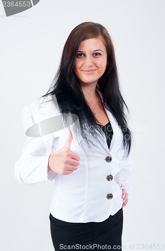 Image of Attractive woman with thumb up