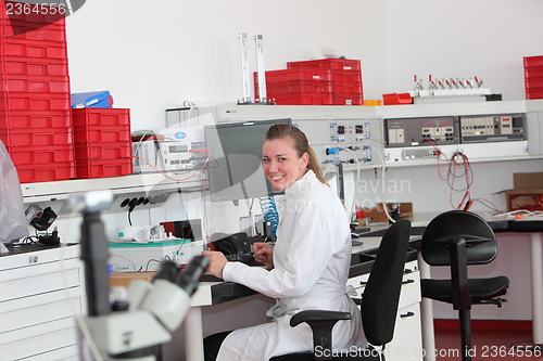 Image of Confident female laboratory technician