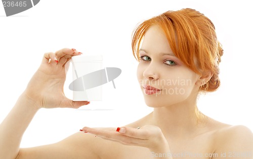 Image of lovely redhead showing blank medication container