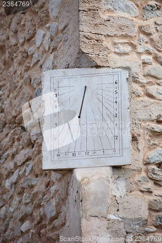 Image of Old clock or sundial