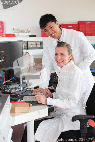 Image of Two technicians at work in a laboratory