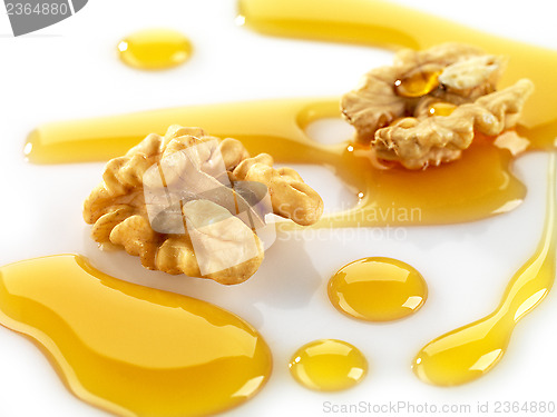 Image of walnuts and maple syrup