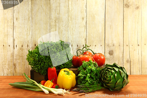 Image of Grocery Produce Items on a Wooden Plank