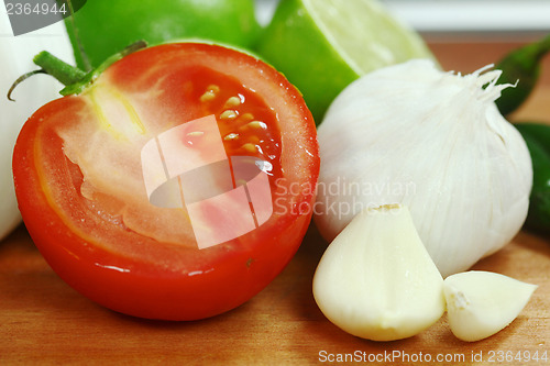 Image of Salsa Ingredients of Avocado, Cilantro, Tomatoes and Peppers